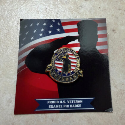 Enamel U.S. veteran pin badge on a patriotic background with the American flag and a dark silhouette outline